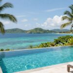 Luxury villa overlooking turquoise waters in East Nusa Tenggara.